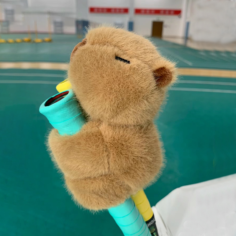 Badminton Grip - ปลอกหุ้มด้ามไม้แบดมินตันลายคาปิบาราน่ารัก ตุ๊กตาผ้ากำมะหยี่ ตุ๊กตาสัตว์ยัดไส้ ของเล่นคลายเครียดสร้างสรรค์